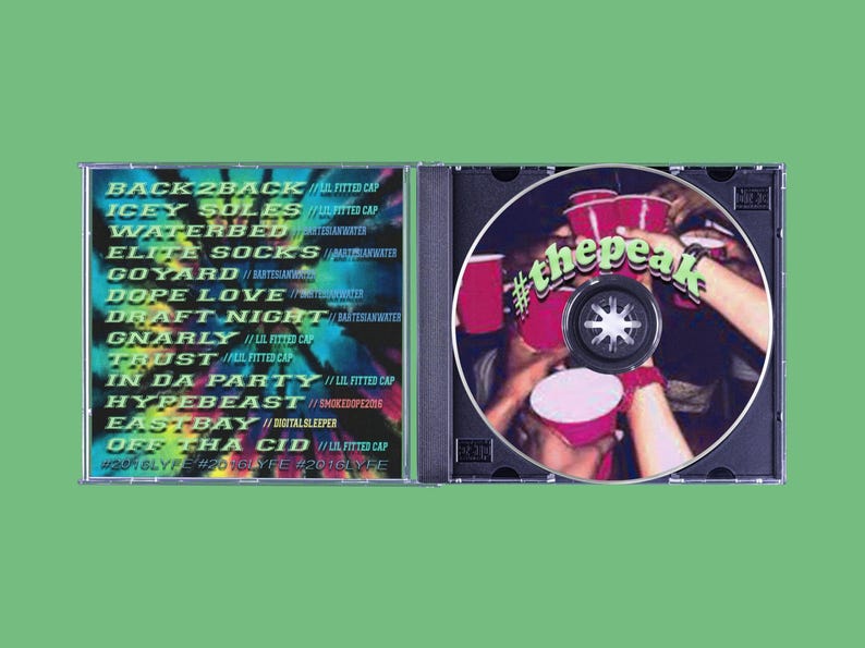 May include: A CD case with a green background. The left side lists song titles like "BACK2BACK" and "ICEY SOLES." The CD itself features a photo of people toasting with red cups, with the text "#thepeak" in green.
