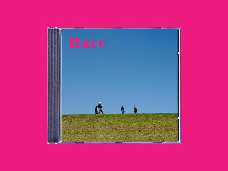 May include: A CD case with a blue sky and green grass background. The title "Race" is printed in pink letters on the front of the case.