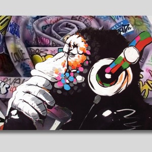 May include: A black and white illustration of a monkey wearing colorful headphones against a background of graffiti. The monkey is holding its chin in thought. The graffiti includes words like "Love", "Life", and "Hello".