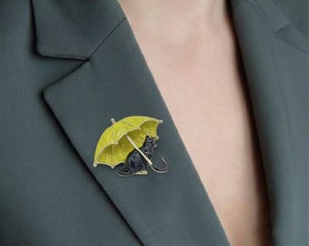 Broche de gato negro con paraguas – Bonito pin de gato esmaltado – Accesorio de paraguas amarillo – Regalo para amantes de los gatos – Joyería caprichosa