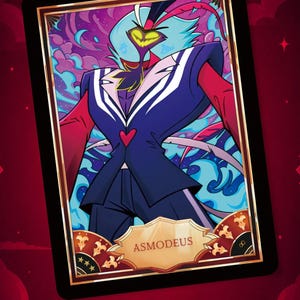 May include: A rectangular fan card featuring a stylized illustration of the character Asmodeus in a dark blue suit with a red heart emblem. The character has light blue hair and red accents. The card has a gold border and the name ASMODEUS printed.