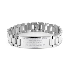 May include: A silver stainless steel bracelet with a silver plaque engraved with the text "THEN I HEARD THE VOICE OF THE LORD SAYING "WHOM SHALL I SEND? AND WHO WILL GO FOR US? AND I SAID, "HERE AM I SEND ME" ISAV 6:8".