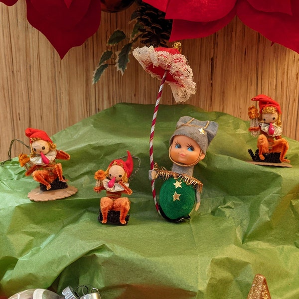 4 mid-century ornaments, amazing little NAPCO guy green uniform w/ big candy-cane umbrella, trio of monkey-elves made of fuzzy plush wires