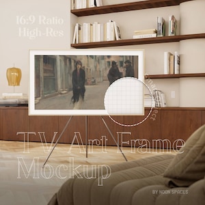 May include: A gold-framed TV screen mockup with a painting of a street scene. The TV is on a black tripod stand and is in a living room setting with a couch and bookshelves.