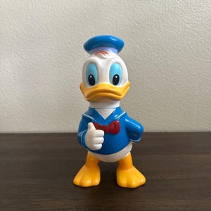 Walt Disney&#39;s Donald Duck duimen omhoog met beweegbaar hoofdknijpspeeltje - vintage uit de jaren 60