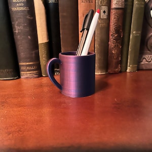 Mini taza con bolígrafo