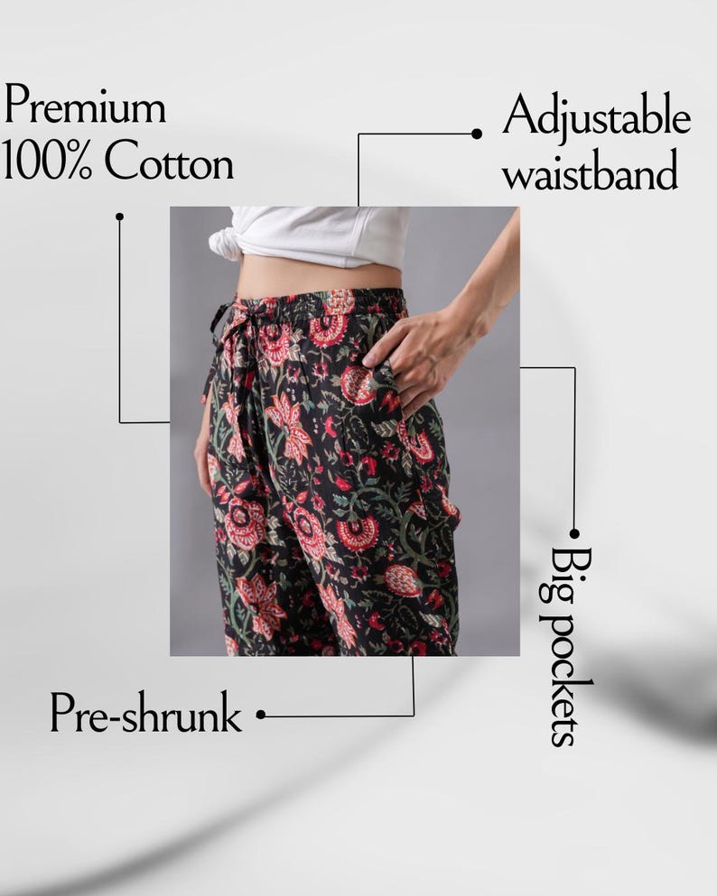 Stylish cotton lounge & sleepwear pants for women with bold red flowers on deep black – soft and comfy pajama bottoms with elastic waist, adjustable drawstring, and practical side pockets, perfect for pajama parties, floral print clothing lovers, or unique handmade jammies that make thoughtful gifts for book lovers or flower fans.
