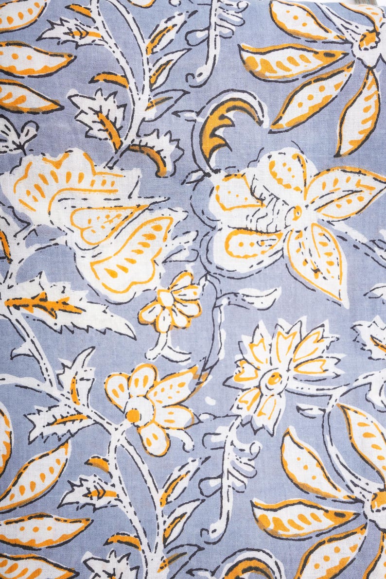 Modern and unique women’s cotton pajama bottoms in gray with bold orange floral pattern – soft, lightweight jammies featuring elastic waistband, drawstring, and roomy side pockets, perfect as trendy lounge & sleepwear, cooling sleep pants for pajama parties, and special cotton anniversary gifts for nature enthusiasts.
