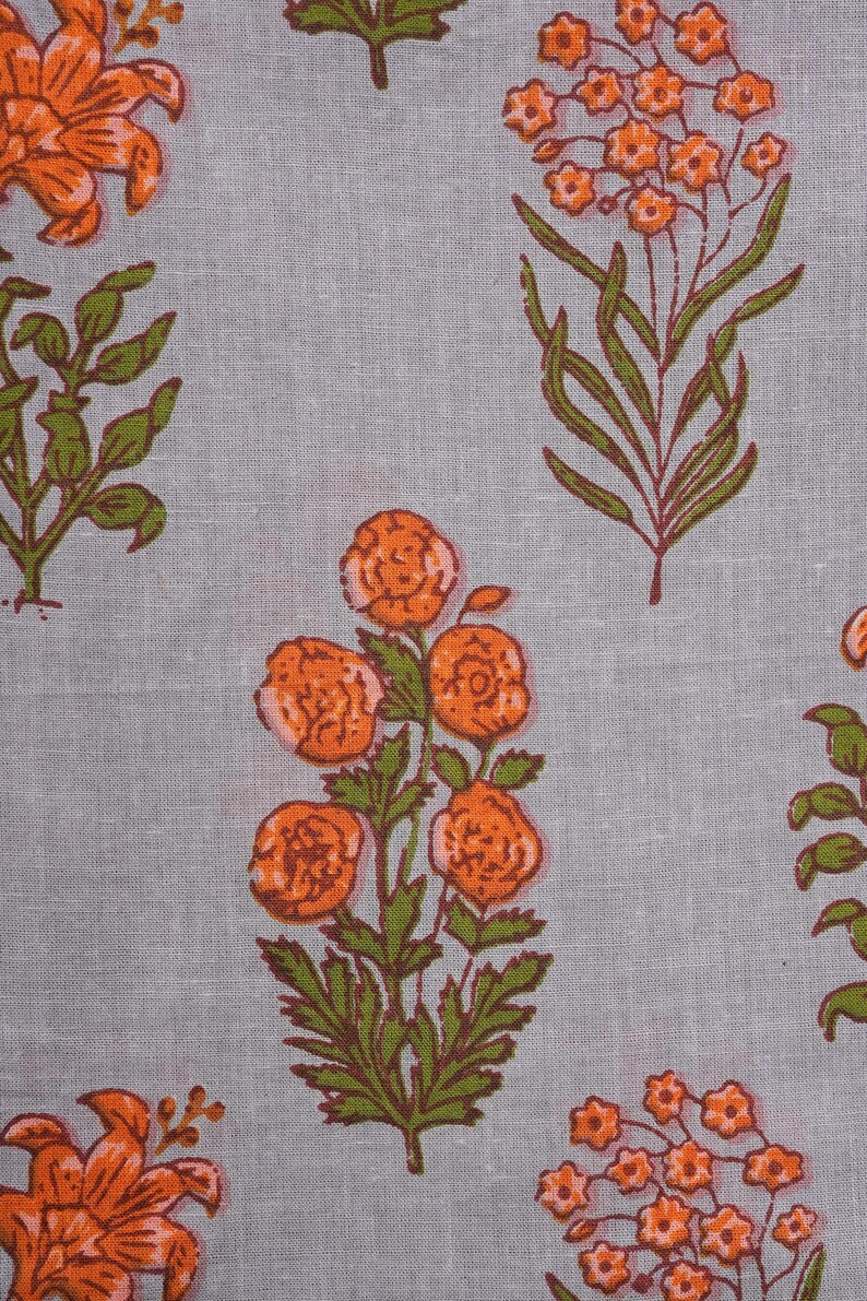 Women’s handmade cotton pajama bottoms in gray with orange floral design – breathable, soft, and lightweight with an elastic waistband and roomy pockets, making them perfect sleep pajamas, comfy lounge pants for warm nights, or trendy cotton gift ideas for nature lovers and modern homebodies.