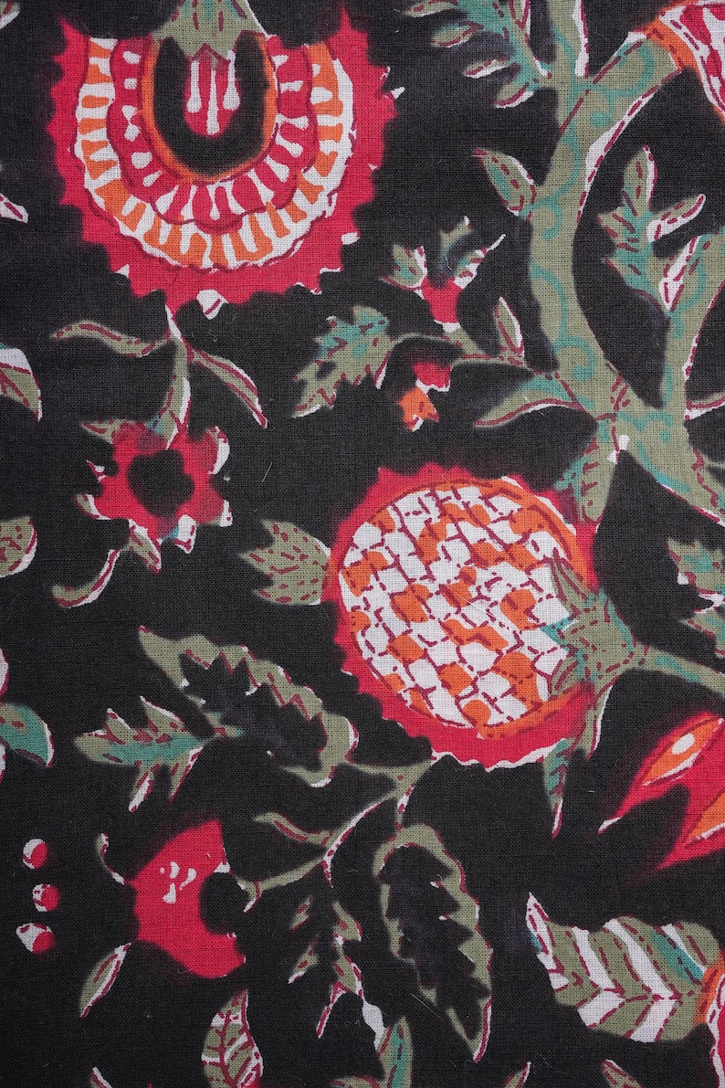 Women’s 100% cotton sleep trousers in a striking red-on-black floral pattern – lightweight and breathable, featuring a relaxed fit, elastic waistband, drawstring closure, and roomy pockets, ideal for lounging, traveling, or gifting as trendy cotton gift ideas or 2nd anniversary presents.
