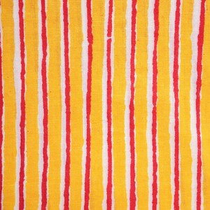 Bold striped women’s lounge pants in red and yellow with breathable 100% cotton fabric – comfy pajama trousers featuring side pockets, elastic waistband, and drawstring, ideal for tropical boho fashion lovers, unique cotton gift ideas, or thoughtful 2nd anniversary gifts for anyone who loves soft, handmade loungewear.