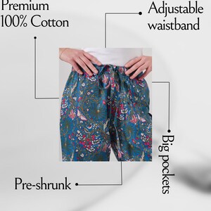Modern, colorful cotton chinos with elastic waist, drawstring closure, and side pockets; lightweight, printed floral butterfly design for pet lovers, travelers, and book lovers.