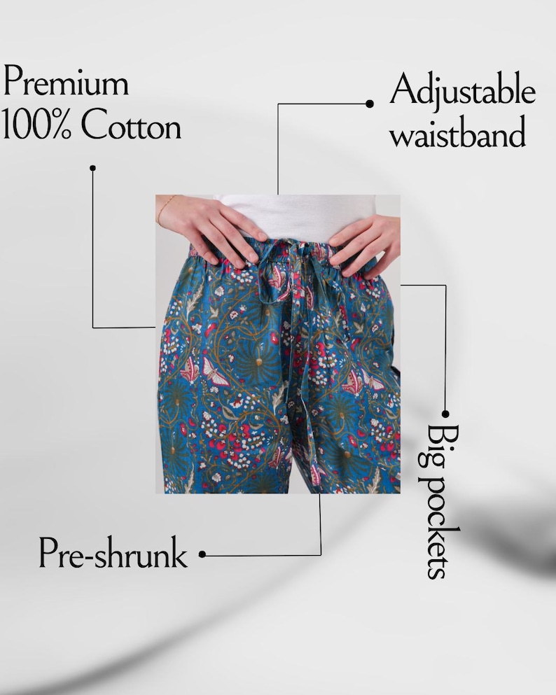 Modern, colorful cotton chinos with elastic waist, drawstring closure, and side pockets; lightweight, printed floral butterfly design for pet lovers, travelers, and book lovers.