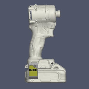 May include: A light grey cordless impact driver featuring a textured handle, a trigger mechanism, and a battery base. A rectangular yellow and grey label with the text BitBOI is attached to the side of the battery pack, which also has embossed text.