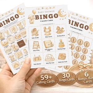 May include: Baby shower bingo calling cards featuring baby-themed illustrations. The cards are in a soft, neutral colour scheme, with the words "Baby Shower Bingo" at the top. Includes 59+ calling cards, 30 bingo cards, and 6 bonus bingo cards.