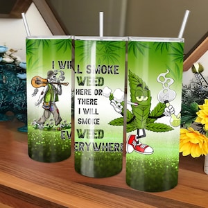 May include: Three green and white insulated tumblers with the text "I WILL SMOKE WEED HERE OR THERE I WILL SMOKE EVERYWHERE" and cartoon illustrations of a skeleton playing a guitar and a marijuana leaf smoking a bong. Each tumbler has a clear straw.