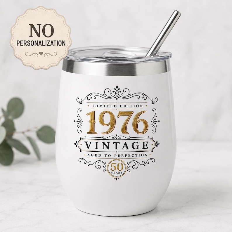 May include: A white stainless steel tumbler with a metal straw, featuring black and gold text that reads Limited Edition 1976 Vintage Aged to Perfection 50 Years. A beige scalloped badge in the top left corner displays the text No Personalization.