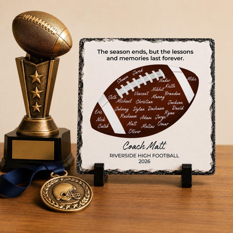 Puede incluir: Un trofeo de f&uacute;tbol americano color bronce con tres estrellas, una medalla dorada con dise&ntilde;o de casco de f&uacute;tbol y una placa de piedra cuadrada con un gr&aacute;fico de bal&oacute;n, nombres y el texto: The season ends, but the lessons and memories last forever. Coach Matt RIVERSIDE HIGH FOOTBALL 2026.