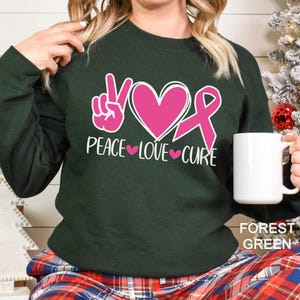 Peace Love Cure Sweatshirt, Breast Cancer Awareness Sweatshirt, Cancer Ribbon Hoodie,Pink Ribbon Hoodie, Breast Cancer Month Crewneck 183510