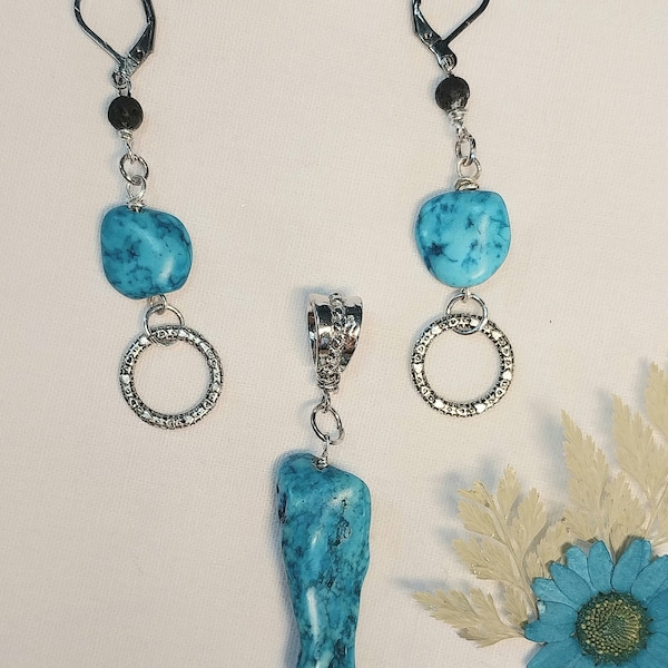 Turquoise drop earrings, with matching pendant,  both accented with silver