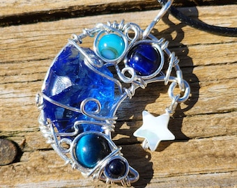 Blue Andara Glass Moon Pendant: Sterling Silver Wire Wrapped Amulet