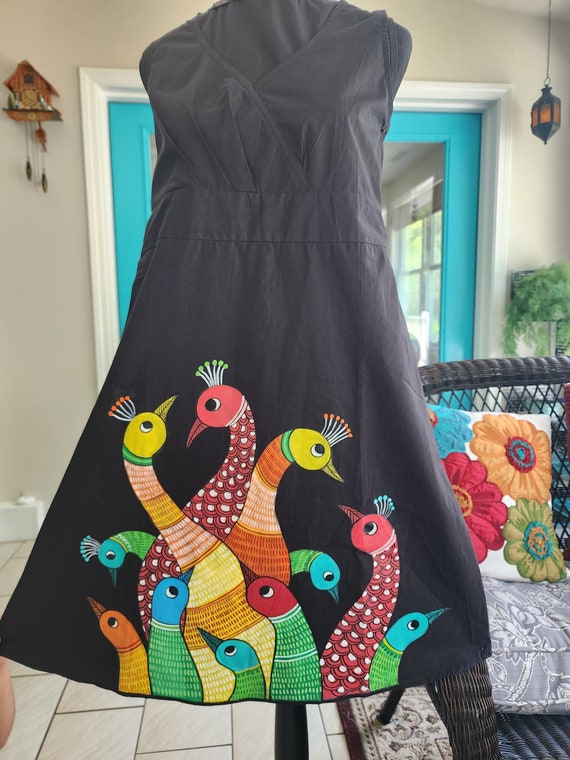 painting on dress design Easy and beautiful free hand fabric paint design. Watch complete video on  my YouTube channel "painting corner "and don't forget to subscribe. Follow  me on instagram #art#fashionstyle #paintings #fabeic #fabricpainting  #freehandpainting #handmade #