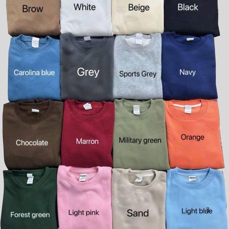 May include: A collection of folded crewneck sweatshirts in various colors, including Carolina blue, grey, and orange. Each sweatshirt displays a color name, such as "Brow", "White", and "Black". The sweatshirts are neatly arranged, showcasing a range of hues.