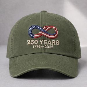 May include: A set of three ceramic mugs with a speckled, matte finish. The mugs are in shades of cream, light gray, and dark gray. Each mug has a simple, minimalist design and a rounded handle. The mugs are suitable for coffee, tea, or other beverages.