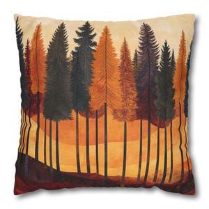 May include: Square throw pillow featuring a watercolor illustration of a forest scene. The design showcases tall trees in shades of orange, brown, and black against a warm, sunset-colored background. The pillow has a soft, textured appearance.