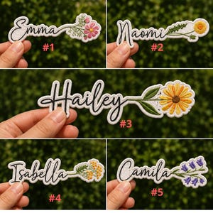 May include: Embroidered name patches with floral designs. The names Emma, Naomi, Hailey, Isabella, and Camila are displayed in cursive script, each accompanied by a unique flower. The patches are white with black outlines and colorful floral accents.