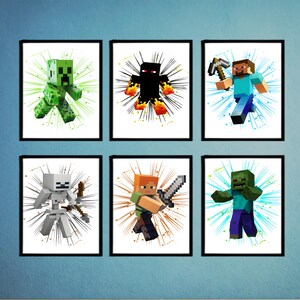 Op de afbeelding: Zes ingelijste kunstprints met Minecraft-personages. De prints tonen een groene Creeper, een vurige Enderman, Steve met een pikhouweel, een skelet met een boog, Alex met een zwaard en een zombie. Elk personage staat tegen een witte achtergrond met kleurrijke spatteneffecten.