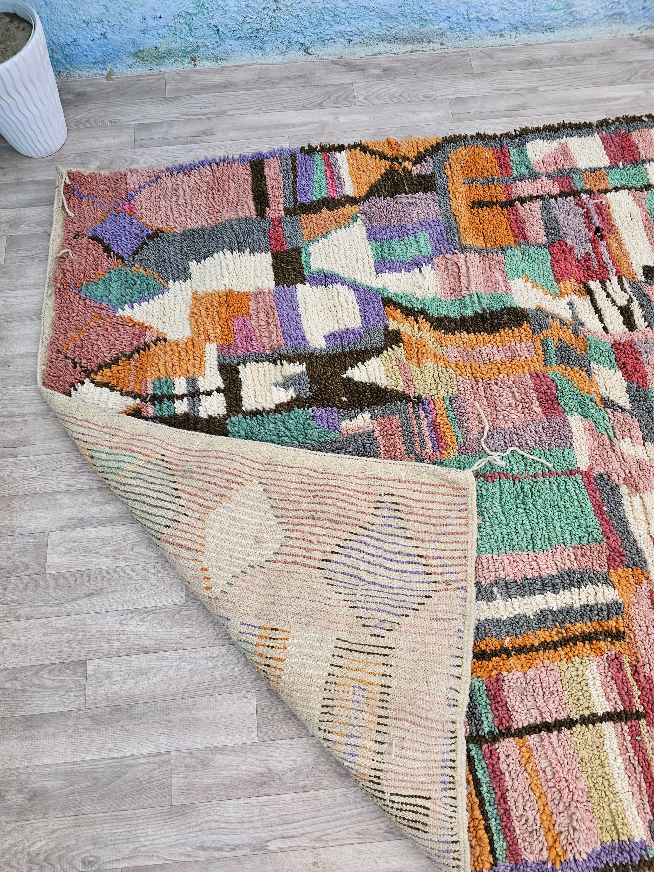 マルチカラーのモロッコラグ：手織りウールのボヘミアンラグ - Etsy 日本