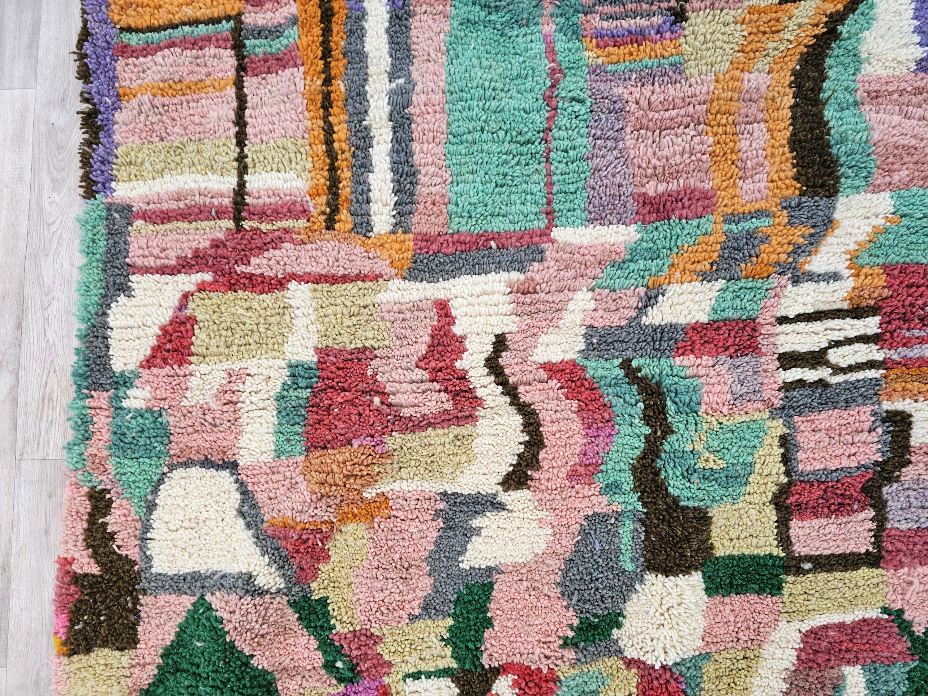 マルチカラーのモロッコラグ：手織りウールのボヘミアンラグ - Etsy 日本