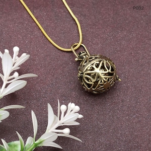 Gold Harmony ball necklace, bola pregnancy necklace, chime necklace, handmade Pendant, musical chime ball, harmony necklace, Ethnic Pendant,