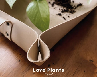 Handgefertigte Kunstledermatte zum Umtopfen von Pflanzen