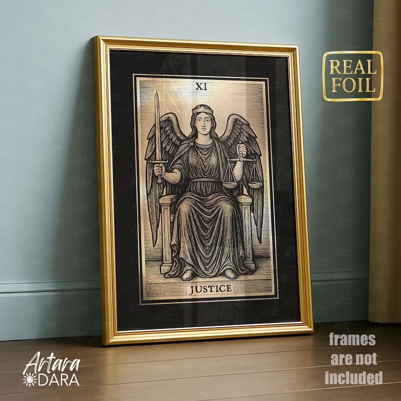 May include: A framed tarot card print featuring the Justice card. The artwork depicts a seated figure with wings, holding a sword and scales. The frame is gold, and the print has a black background. The text "REAL FOIL" is visible.