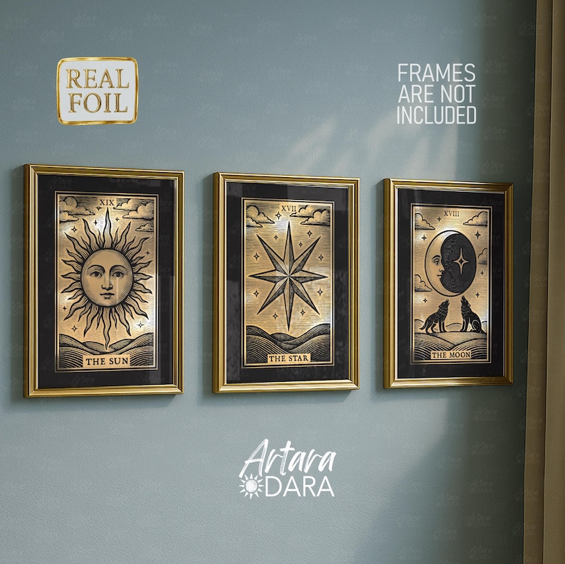 May include: Three framed tarot card prints with gold foil accents. The prints feature the sun, star, and moon tarot cards. The frames are gold with black matting. The text "REAL FOIL" and "FRAMES ARE NOT INCLUDED" are visible.