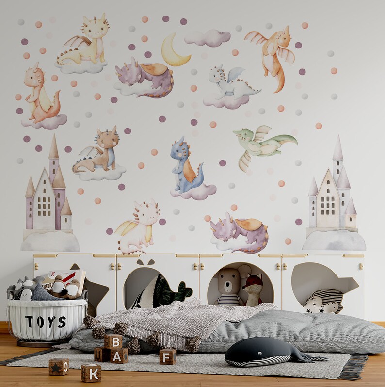 Magical watercolor nursery decal set with playful cute baby dragon wall decal dragons, fairytale castles and soft clouds – ideal dragon sticker and nursery decor for baby dragon nursery.