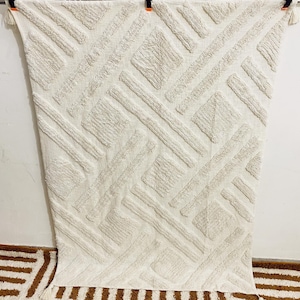 Handwoven Ivory Cotton Throw Blanket: Tufted Boho Geometric Accent 52x72 Inches