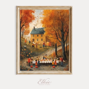May include: A framed print of a fall harvest scene. The artwork depicts a gathering with a long table set for a feast, surrounded by people and pumpkins. The background features a house, trees with orange leaves, and a blue sky.