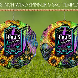 May include: Two 10 and 8 inch wind spinners with a Hocus Pocus Co. Witches Wanted design. The spinners feature a purple, green, and yellow color scheme with sunflowers, skulls, and a spooky house.