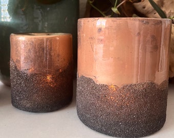 Copper toned sand finish hurricane candle holder comes in two sizes 3 inch and 4 inch