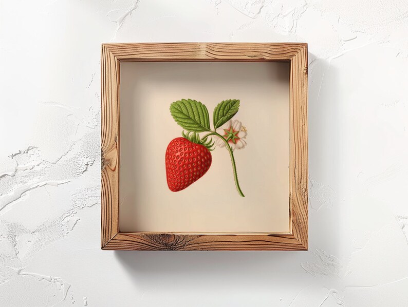 May include: A framed illustration of a single red strawberry with green leaves and a white flower. The frame is made of natural wood with a rustic finish.