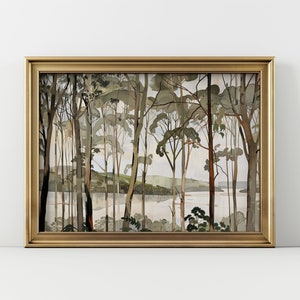 May include: A framed watercolor painting depicting a forest scene with a river in the background. The trees are painted in shades of green, brown, and gray, and the river is a light blue. The painting is framed in a gold frame.