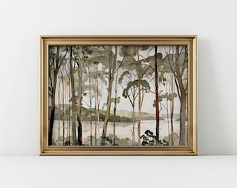 May include: A framed watercolor painting depicting a forest scene with a river in the background. The trees are painted in shades of green, brown, and gray, and the river is a light blue. The painting is framed in a gold frame.