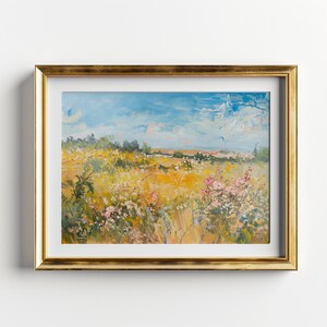 May include: A framed painting of a landscape with a field of wildflowers in the foreground and a blue sky with clouds in the background.