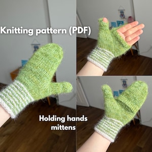 May include: Green knitted mittens with a white and green striped cuff. The mittens are designed to allow the thumb and fingers to be exposed. Text on the image reads "Knitting pattern (PDF)" and "Holding hands mittens."