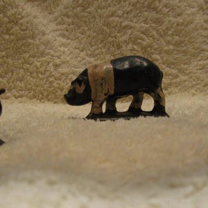Three Vintage Toy Black and White Rubber Pigs. Auburn Rubber Co. Made in USA