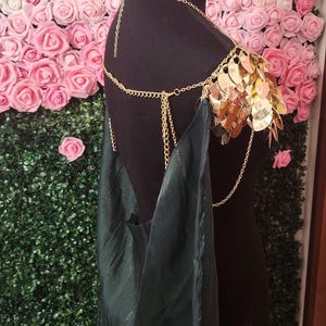 Scalemaille, Dragon scales, scale mail shoulder armor pauldron, gold with a long dark green cape