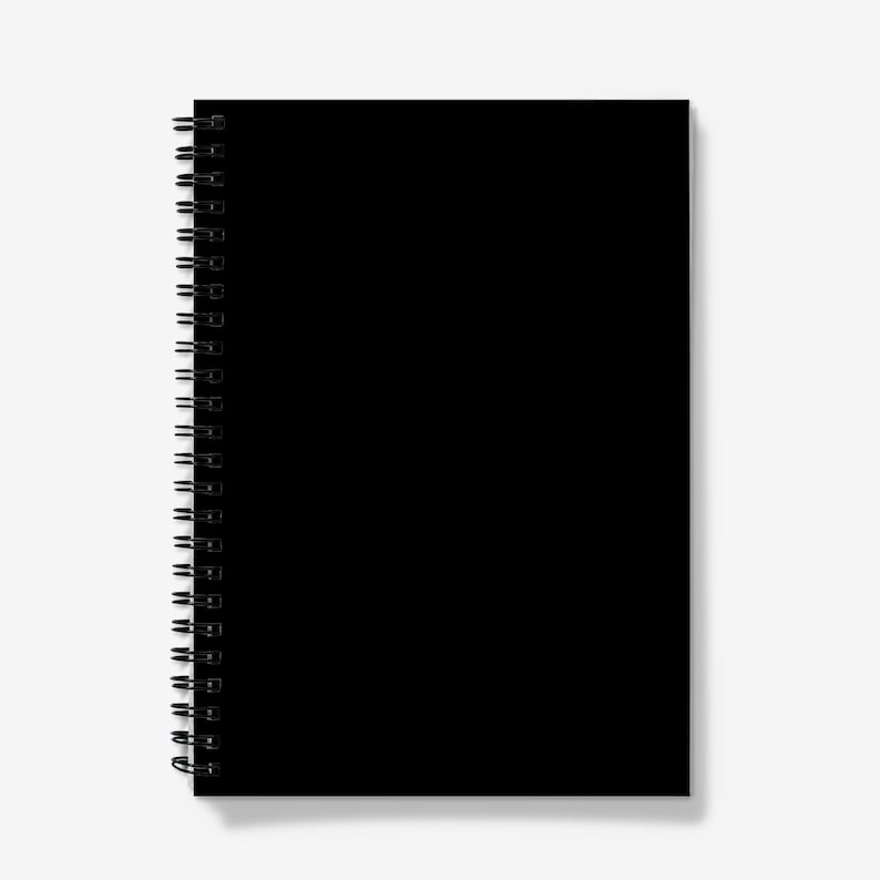 May include: A black spiral-bound notebook with a solid black cover. The notebook's pages are not visible. The spiral binding is made of black metal. The notebook is set against a white background.